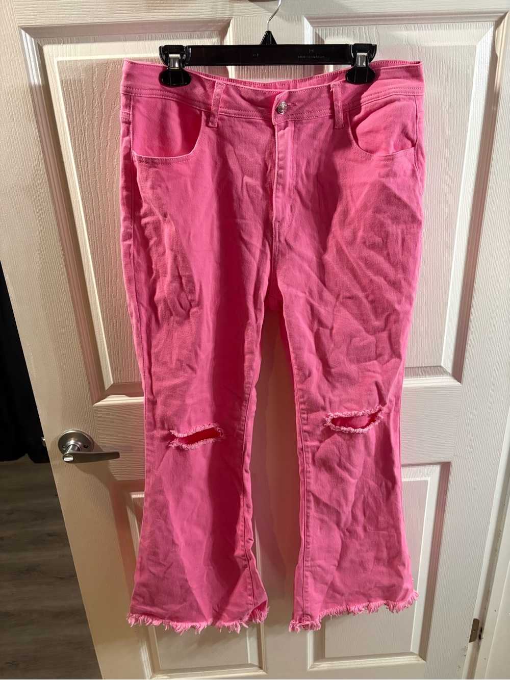 Women's Pink Flare Jeans with Distressed Knees